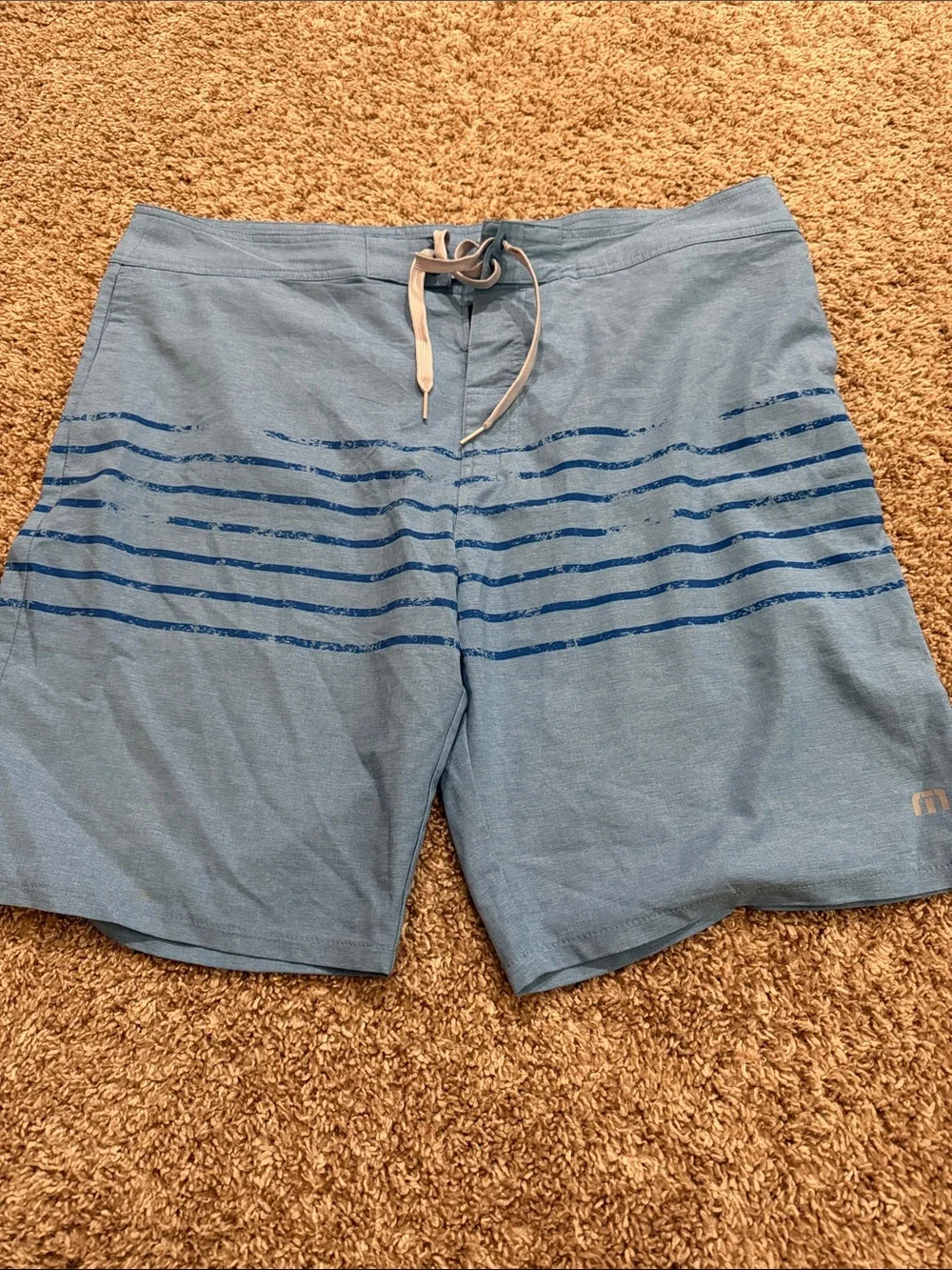 Travis Mathew Sky Blue Swim Trunks with Navy Stripe Accent